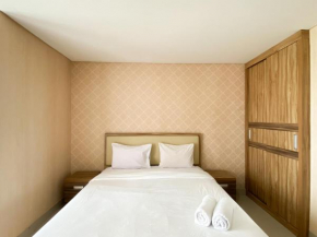 Homey and Simply Studio The Enviro Apartment By Travelio